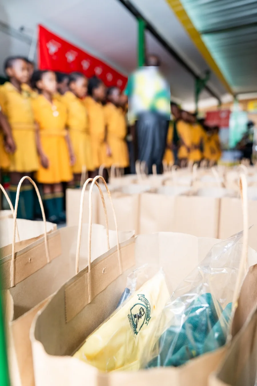 A uniform bag at Inxiweni Primary School showing the folded school uniform packed inside